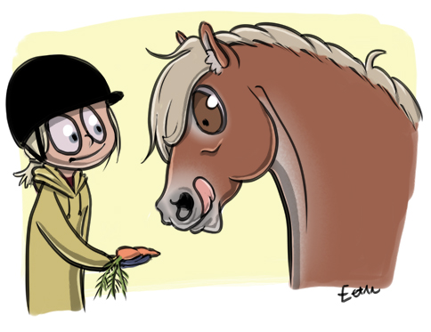 Lapsi antaa porkkanaa ponille